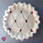 a overhead shot of a pie with a fat lattice crust design made from the best pie crust recipe