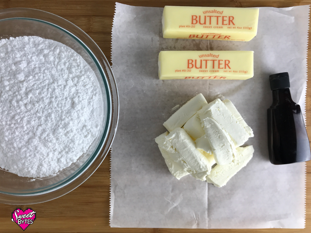 Ingredients for cream cheese frosting: powdered sugar, butter, cream cheese, and vanilla 